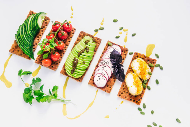 easy sandwiches on the crackling wholegrain toast with avocado,  - Fotografie, Obrázek