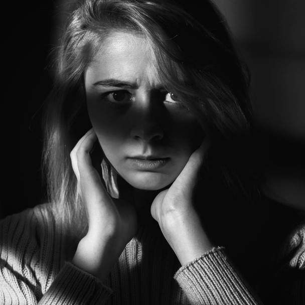 Portrait of the woman in shadows. Black and white. Low key - Fotografie, Obrázek