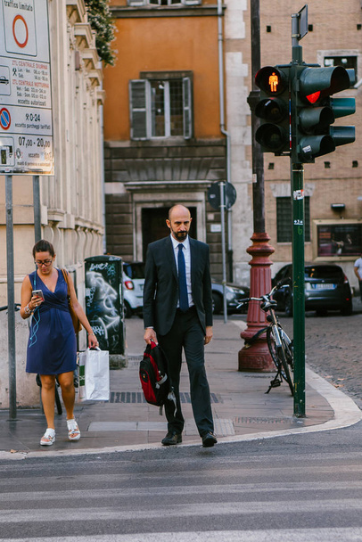 ROME, ITALY - 12 SEPTEMBER 2018: Pedestrian crossing the road in Rome - Zdjęcie, obraz