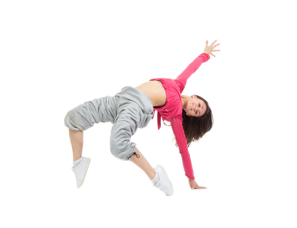 pretty modern slim hip-hop style teenage girl jumping dancing - Fotoğraf, Görsel