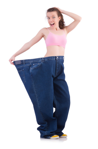 Woman in dieting concept with big jeans - Foto, Imagen
