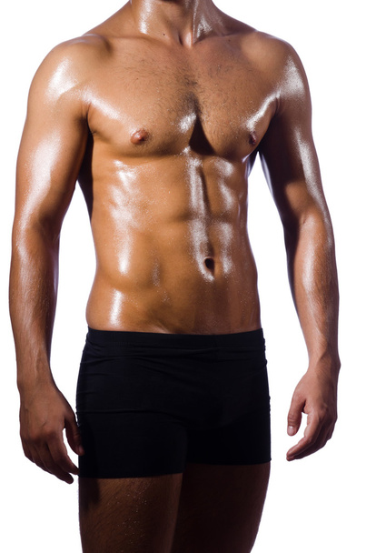 Hombre muscular aislado en el blanco
 - Foto, imagen