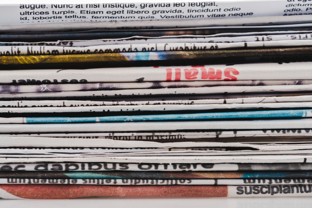 background with different print daily newspapers in pile  - Photo, Image