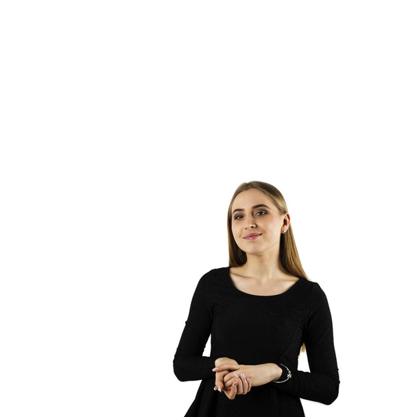Young woman in black on white background. - Foto, afbeelding