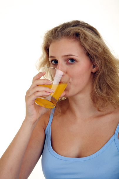 Girl drinking a juice - Фото, зображення