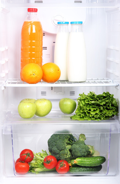 Open refrigerator with vegetarian (diet) food - Foto, imagen
