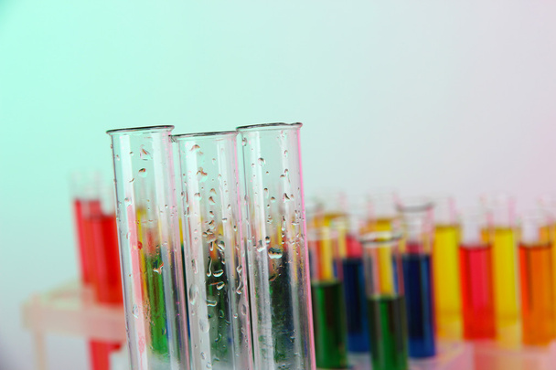 Empty and colorful test tubes close-up - Φωτογραφία, εικόνα