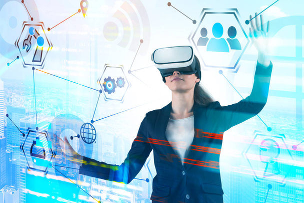 Young woman in VR headset, GUI interface - 写真・画像