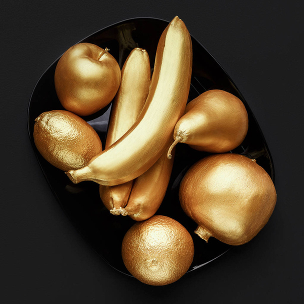 Fruits in golden glaze - Photo, Image