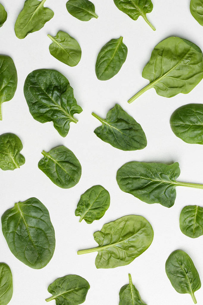 Fresh leaves of spinach isolated on white, top view - Foto, immagini
