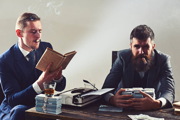 Our business. Money brokers counting profit increase. Successful investment in business. Businessmen write financial report while drinking and smoking. Business partners with cash money - Φωτογραφία, εικόνα