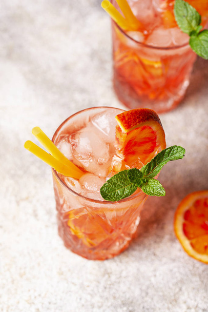 Negroni  cocktail with orange and ice - Zdjęcie, obraz