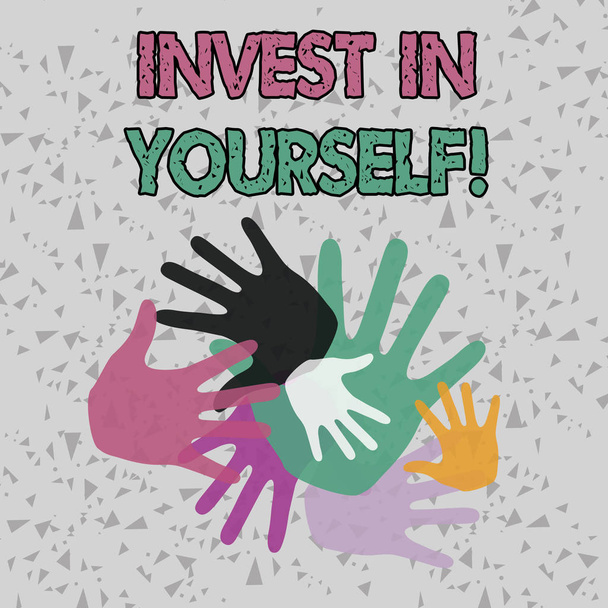 Text sign showing Invest In Yourself. Conceptual photo learn new things or materials thus making your lot better Color Hand Marks of Different Sizes Overlapping for Teamwork and Creativity. - Photo, Image