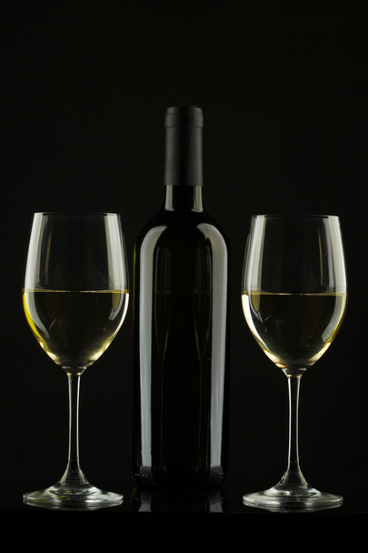 white wine glass silhouette black background - Foto, Imagem