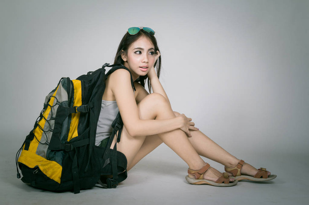 Lifestyle traveler asian girl with backpack - Fotoğraf, Görsel