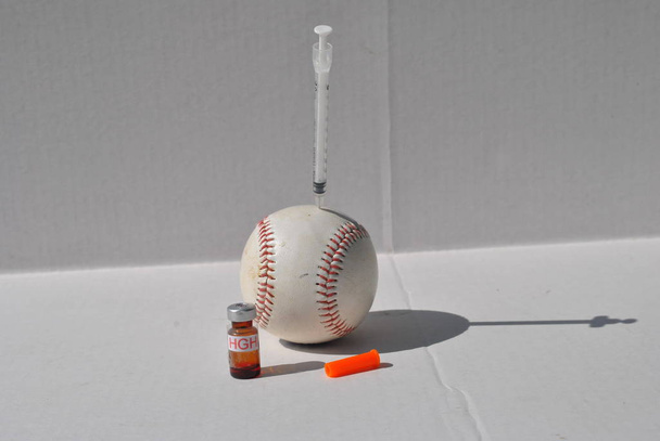 steroid  drug  being  injected  into  baseall - Photo, Image