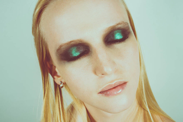 Makeup with green shadows - Фото, изображение
