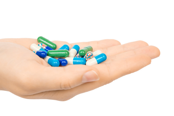 kleur pillen capsules - Foto, afbeelding