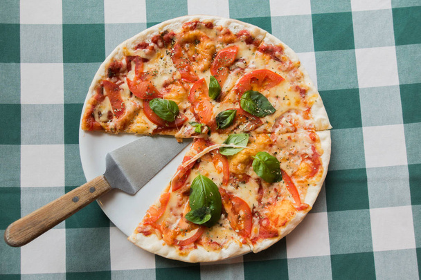 Pizza margarita on a plate - Photo, Image