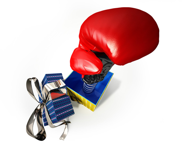 Боксерська рукавичка виходить з подарункової коробки
 - Фото, зображення