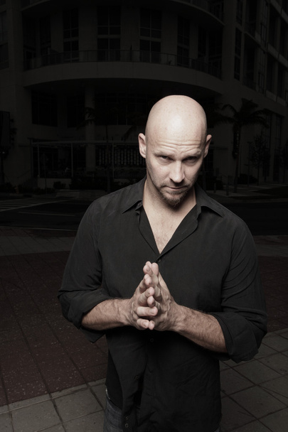 Bald man with hands clasped - Φωτογραφία, εικόνα
