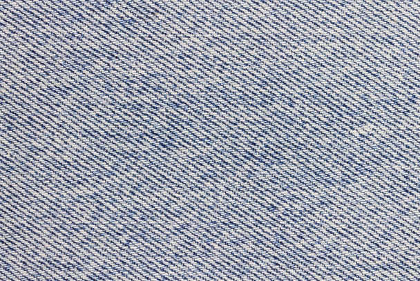 Nieuwe donker blauwe jeans of denim stof textuur achtergrond voor desig - Foto, afbeelding