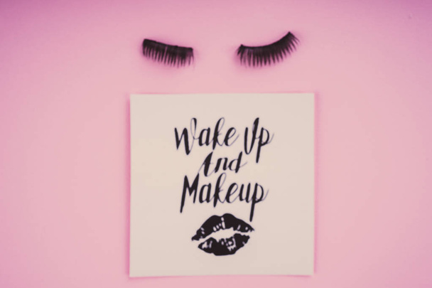 Various makeup products on pink background - Foto, Imagem