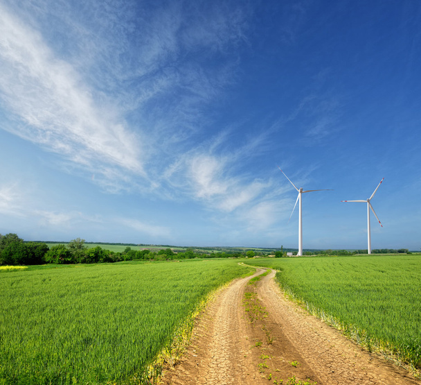 wind turbines on a beautiful spring field - Valokuva, kuva