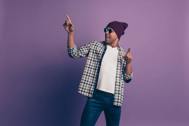 Portrait of cheerful positive excited ecstatic nice student millennial person wearing denim pants trousers isolated violet background - Φωτογραφία, εικόνα