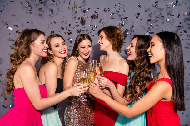 Portrait of nice-looking trendy lovely charming attractive gorgeous stunning cheerful company ladies having fun nightlife gathering congrats greetings dress isolated over violet gray background - Fotoğraf, Görsel