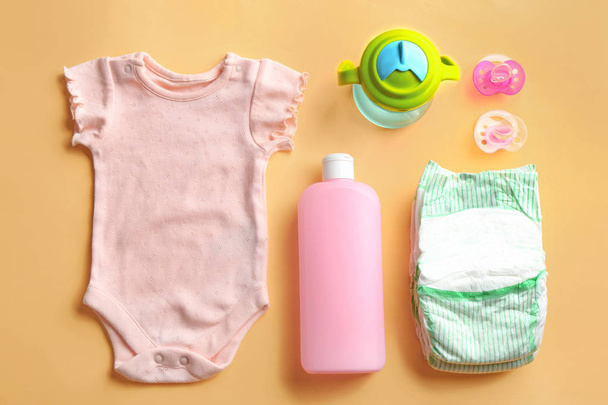 Flat lay composition with baby accessories on color background - Φωτογραφία, εικόνα