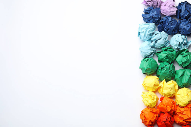 Colorful paper balls on white background, top view - Foto, imagen