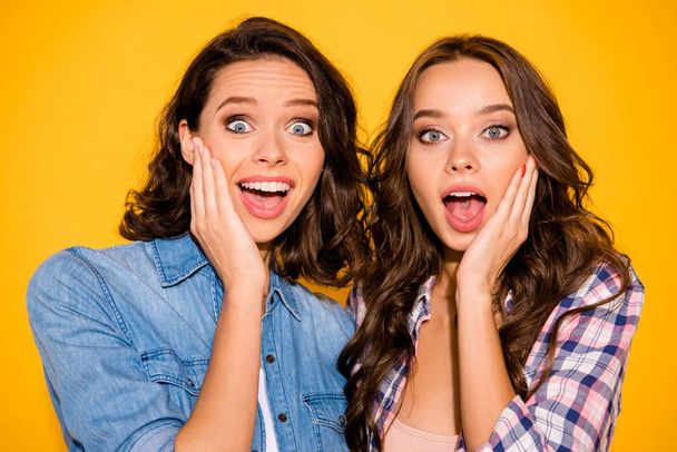 Close up photo nice cute fellows fellowship astonished impressed sales information black friday shout scream palm hand touch face cheek wear summer plaid denim outfit isolated yellow background - Zdjęcie, obraz