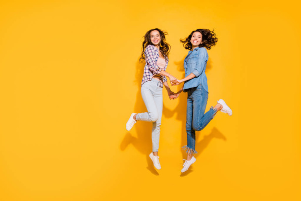 Full length body size view photo charming nice fellows fellowship funny funky satisfied content free time summer travel  fool weekends holiday long hair isolated yellow background checked jeans shirts - Fotó, kép