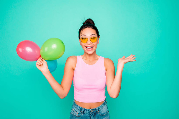 Close up photo beautiful funky hairstyle she her lady hold hands arms three air balloons birthday congrats best friend gift present wear specs casual tank-top isolated bright teal turquoise background - Foto, afbeelding