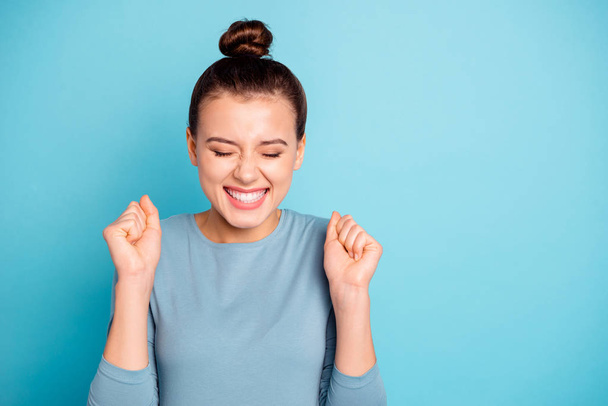 Close up photo beautiful amazing cute she her lady eyes closed crazy hold hands arms raised yelling goal funny funky trendy stylish hairstyle wear sweater pullover isolated blue bright background - Foto, Imagem