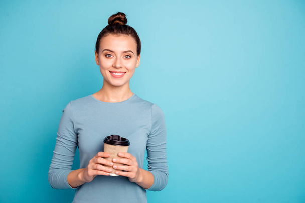 Portrait of her she nice-looking attractive lovely cheerful cheery girl holding in hands hot sweet coffee take-away isolated over bright vivid shine turquoise background - Fotografie, Obrázek