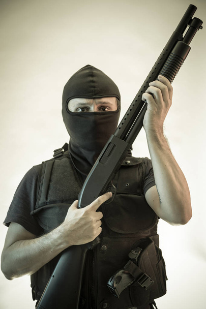 Security, man armed with shotgun and bulletproof vest - Фото, зображення
