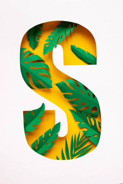 letter s cut from paper with tropical palm leaves from paper - Fotó, kép