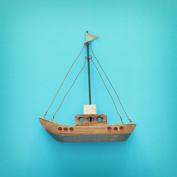 wooden vintage boat over blue background - Photo, Image