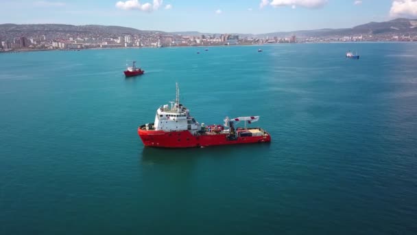 Aerial footage of tanker ships on water in sunny day, wide angle view - Footage, Video
