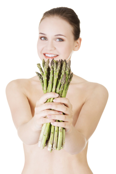 Pretty woman with healthy food - asparagus - Φωτογραφία, εικόνα