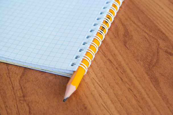 Pencil and pen with notepa - Valokuva, kuva