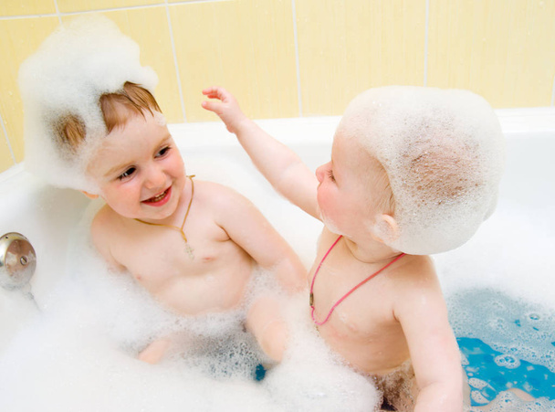 Bathing child.Health and hygiene.Small child in bath - Foto, Bild