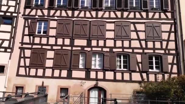 Traditional colorful houses in La Petite France, Strasbourg, Alsace, France. Medieval home facade, historic town. Beautiful architecture on the  idyllic river bank. - Footage, Video