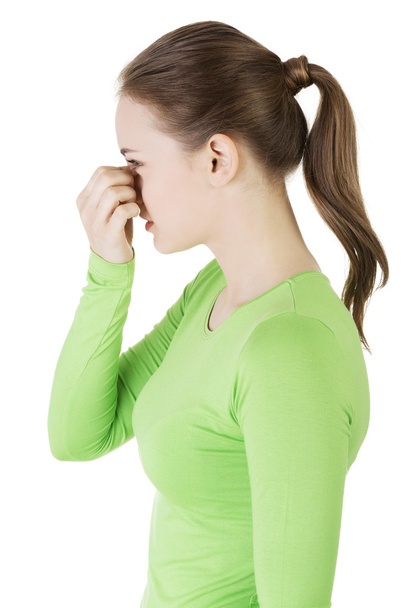 Young woman with sinus pressure pain - Fotó, kép