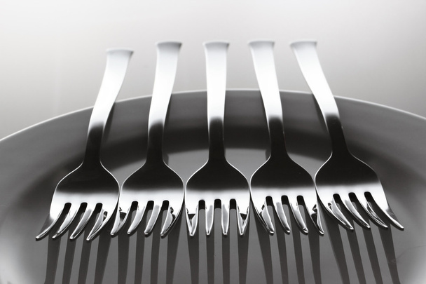 Aligned forks - Zdjęcie, obraz