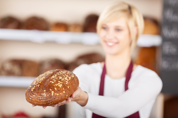 Waitress Giving Sweet Bread In Cafe - Фото, изображение