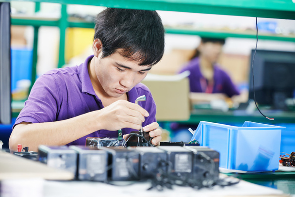 Chinese male worker at manufacturing - Foto, Imagem