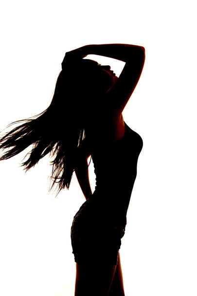 woman silhouette hair blowing hand up - Foto, Imagem